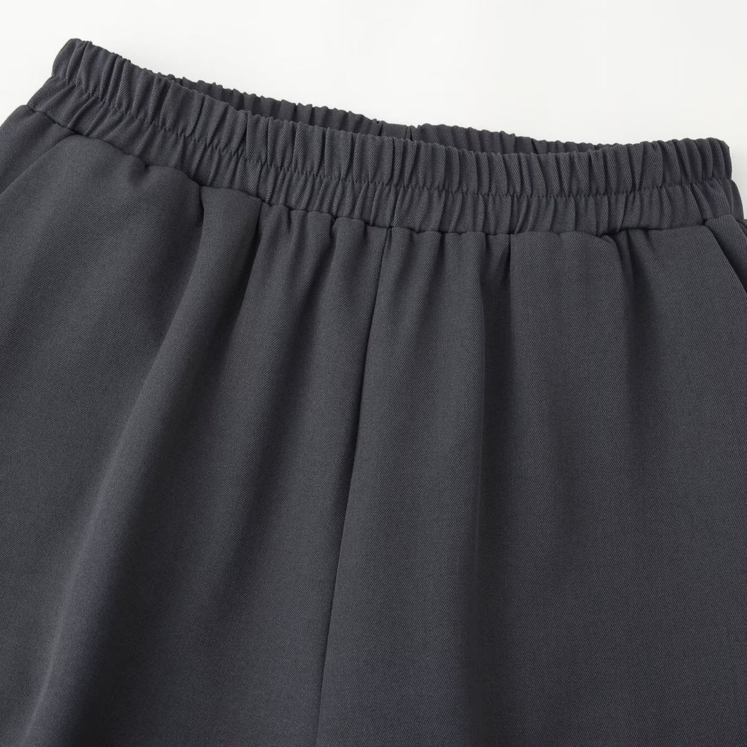 Damen Weite High‑Waist Jogginghose mit elastischem Bund, Eingrifftaschen und gerafften Beinabschlüssen Shop Nory