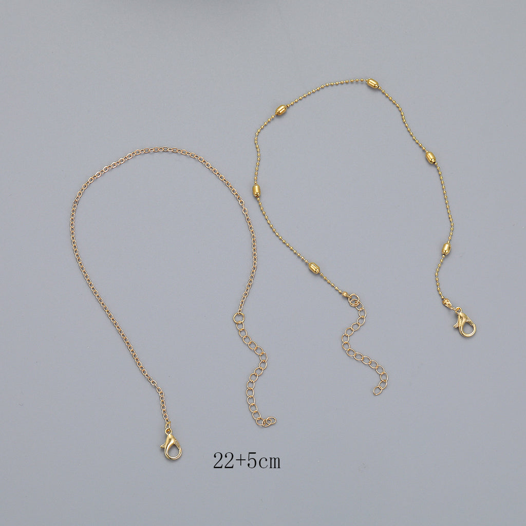 Damen Fußkettchen mit silbernem Herz-Detail und zarten Perlen Shop Nory