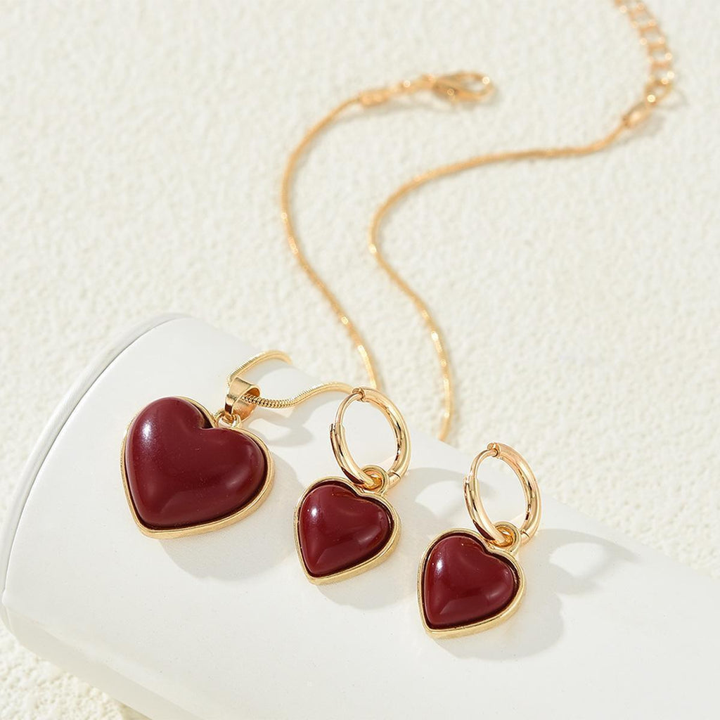 Damen Schmuckset mit herzförmigen Anhängern und goldfarbener Kette Shop Nory