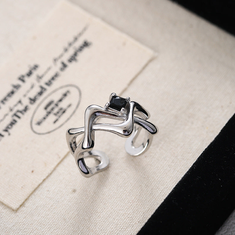 Damen Offener Ring mit künstlerisch geschwungenem Design und zentralem Stein Shop Nory