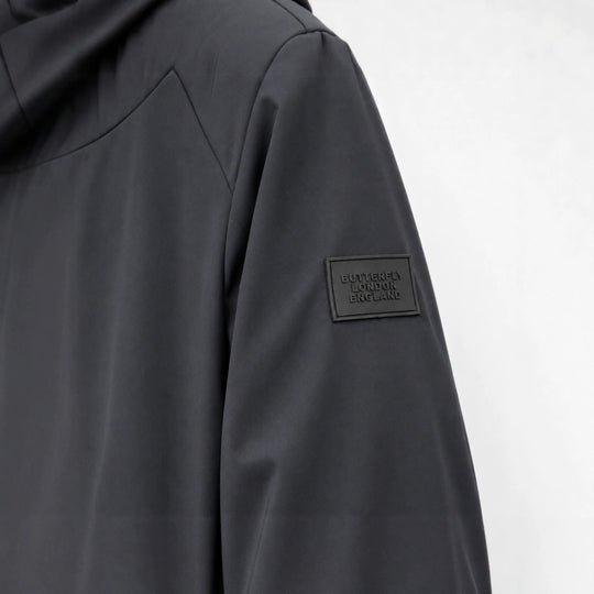 Herren leichte winddichte Softshell‑Kapuzenjacke mit kariert gefütterter Kapuze Shop Nory