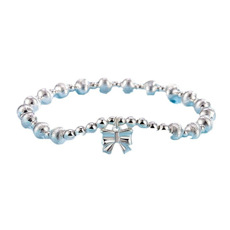 Damenarmband mit kunstvollem Schmetterlingsanhänger und strukturiertem Design Shop Nory
