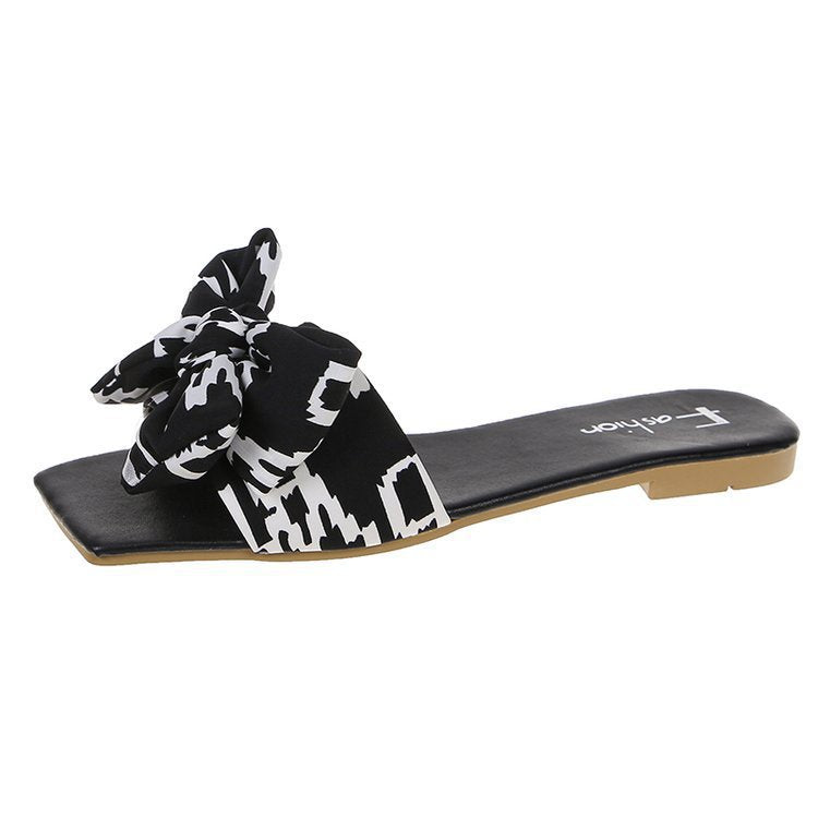 Damen Flache Riemen-Slides mit großem Stoffknoten und quadratischer Zehenpartie Shop Nory