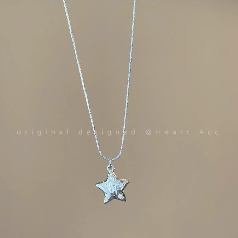 Damen Halskette mit funkelndem Sternanhänger und eleganter Gliederkette Shop Nory