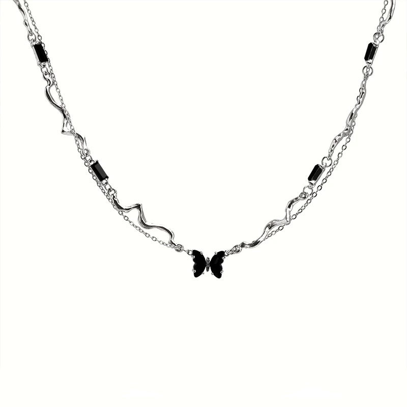Damen Kette mit elegantem Wellenmuster und hochwertigen Steinakzenten Shop Nory