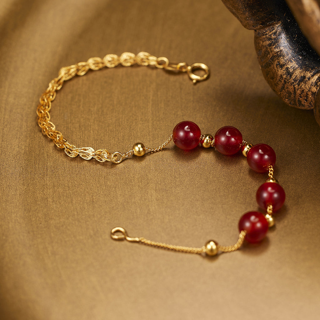 Damen zartes Armband mit hochwertigen roten Halbedelsteinen und goldener Gliederkette Shop Nory