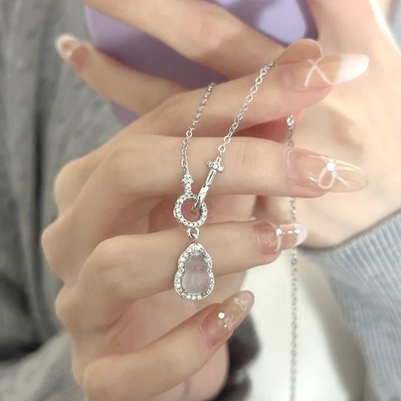Damen Halskette mit eleganten Anhängern aus funkelndem Zirkonia und hochwertigem Edelstahl Shop Nory