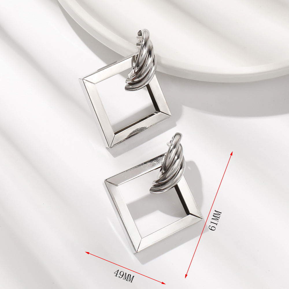 Damen Ohrringe im zeitgenössischen Quadratringdesign Shop Nory