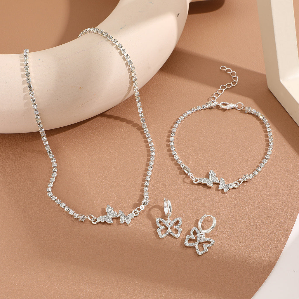 Damen Schmuckset mit funkelnden Schmetterlingsmotiven und elegantem Design Shop Nory