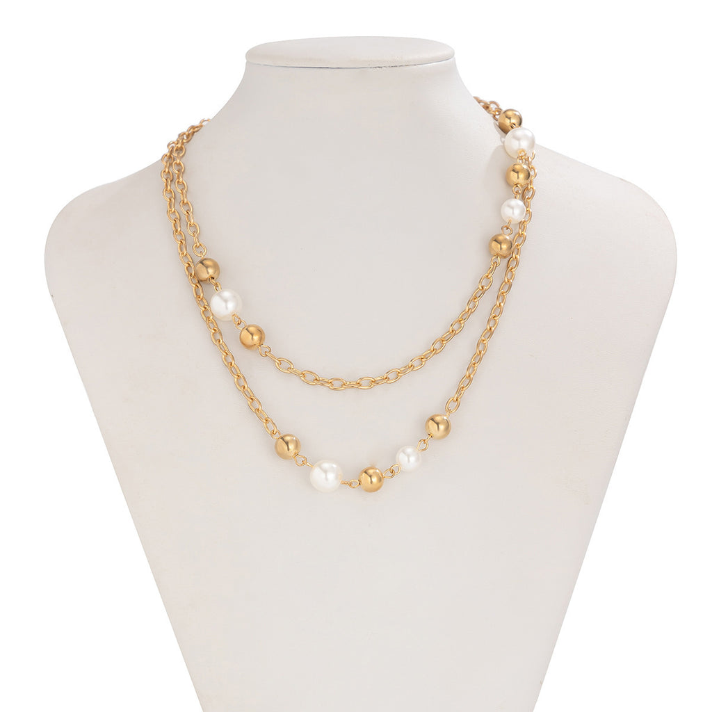 Damen Halskette mit Perlen und goldfarbenen Akzenten Shop Nory
