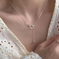 Damen Halskette mit modernem Zwischenelement und elegantem Anhänger Shop Nory
