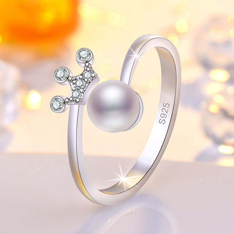 Damen eleganter Ring mit Perlenakzent und funkelnden Zirkonia Shop Nory