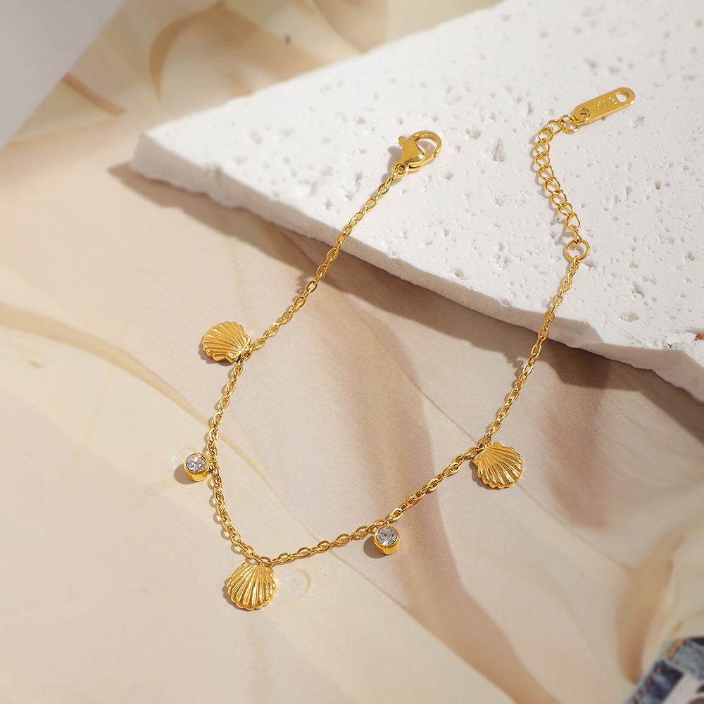Damen zierliches Armband mit Muschel-Design und funkelndem Kristall Shop Nory