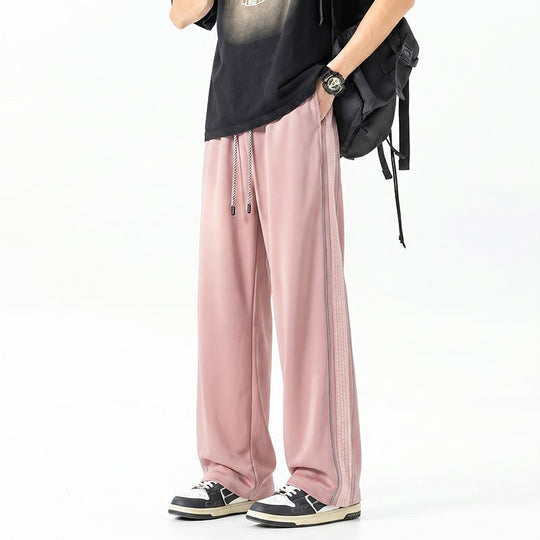 Herren Weite Trackhose im Oversize‑Schnitt mit Tunnelzug und seitlichem Karomuster‑Streifen Shop Nory