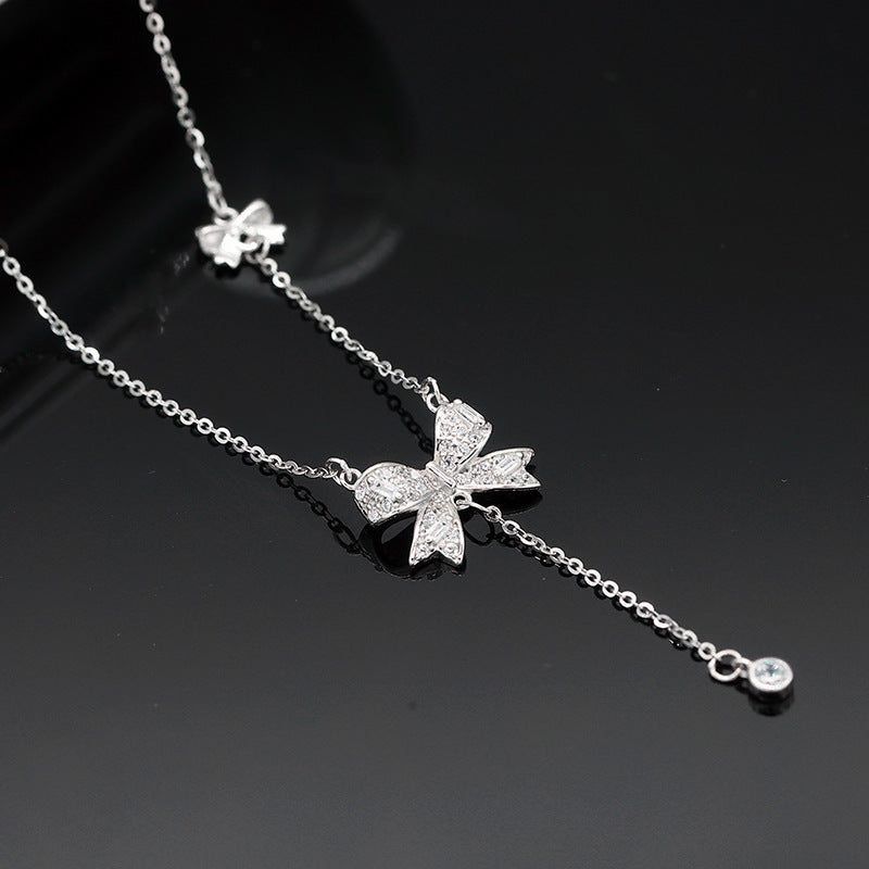 Damen Halskette mit filigranem Schmetterlingsdesign und funkelnden Zirkonia Shop Nory