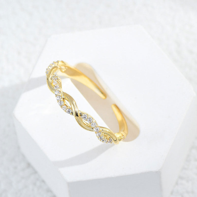 Damenring im eleganten Knoten-Design mit funkelnden Zirkonia-Steinen Shop Nory