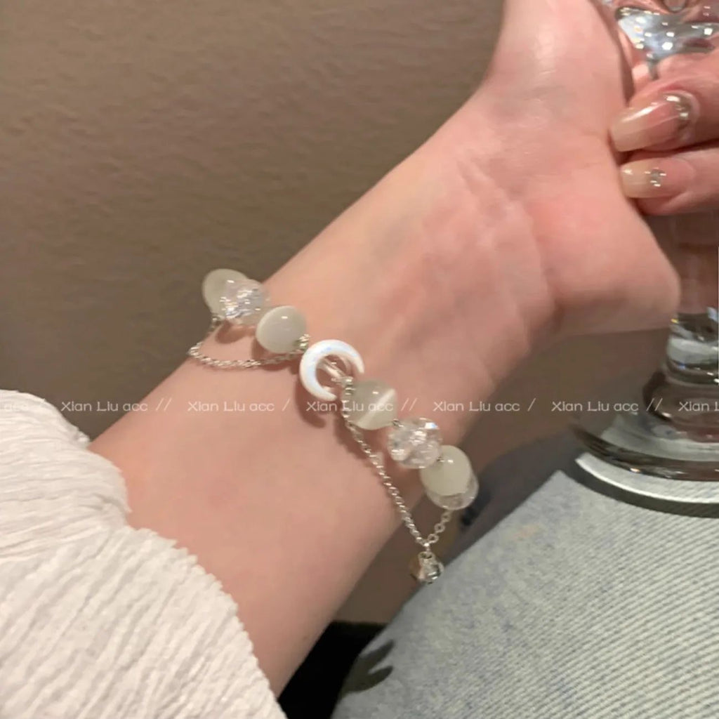 Damen Armband aus glitzernden Kristallen und feinen Edelsteinen Shop Nory