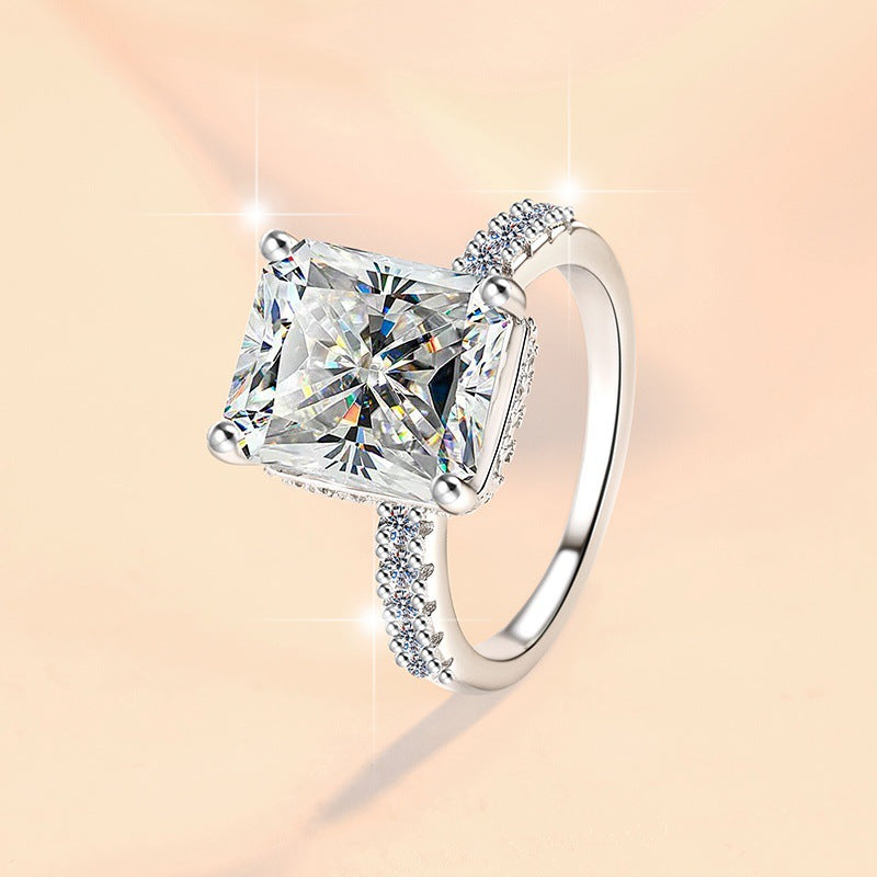 Damen Verlobungsring mit kunstvollem Zirkonia und elegantem Rahmen Shop Nory