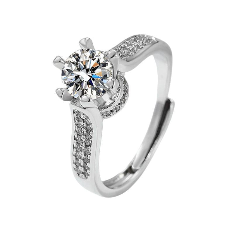 Damen eleganter Ring mit funkelndem Solitär und verspieltem Zirkonia-Besatz Shop Nory