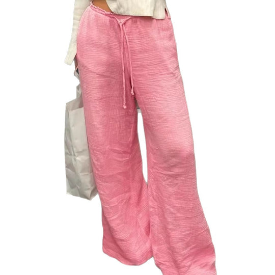 Damen Leinenhose mit lockerer, knöchellanger Passform, seitlichen Eingrifftaschen und Zierknopf-Details Shop Nory
