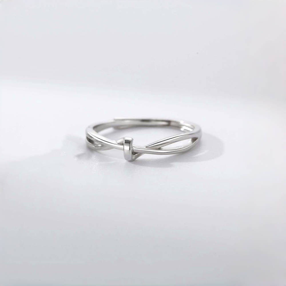 Damenring mit zeitgenössischem, geschwungenem Design und elegantem Knoten Shop Nory