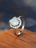 Damen Ring mit funkelndem Opal und eleganter Zirkonia-Verzierung Shop Nory