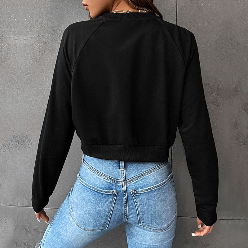 Damen Kurzes minimalistisches Sweatshirt mit Raglanärmeln und geripptem Saum Shop Nory