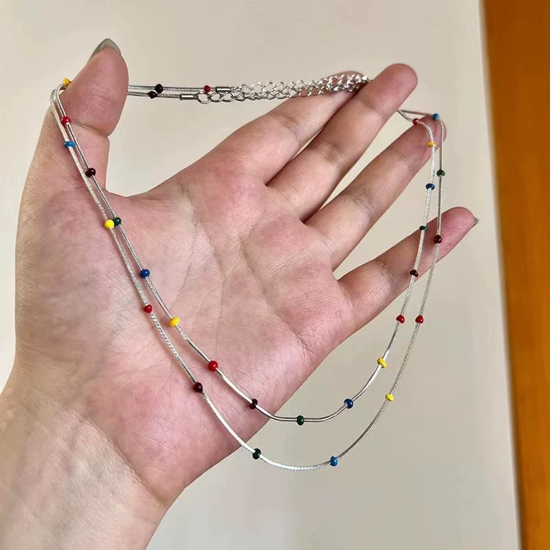 Damen mehrlagige Kette mit bunten Akzenten und filigranem Design Shop Nory