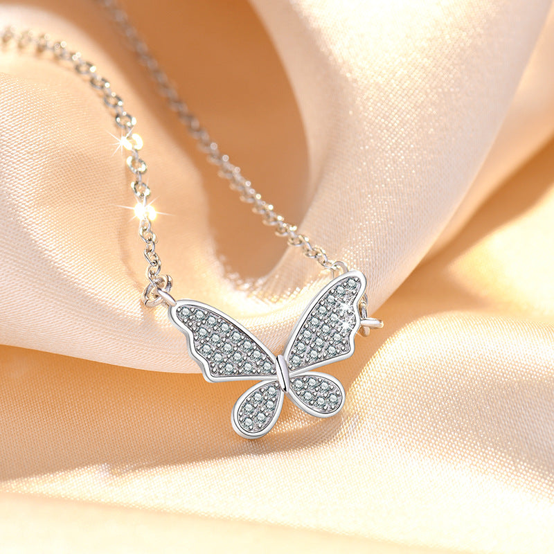 Damen Halskette mit filigranem Schmetterlingsanhänger und funkelnden Zirkonia Shop Nory