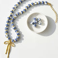 Damen dekorative Halskette mit einzigartigem Schleifenanhänger Shop Nory