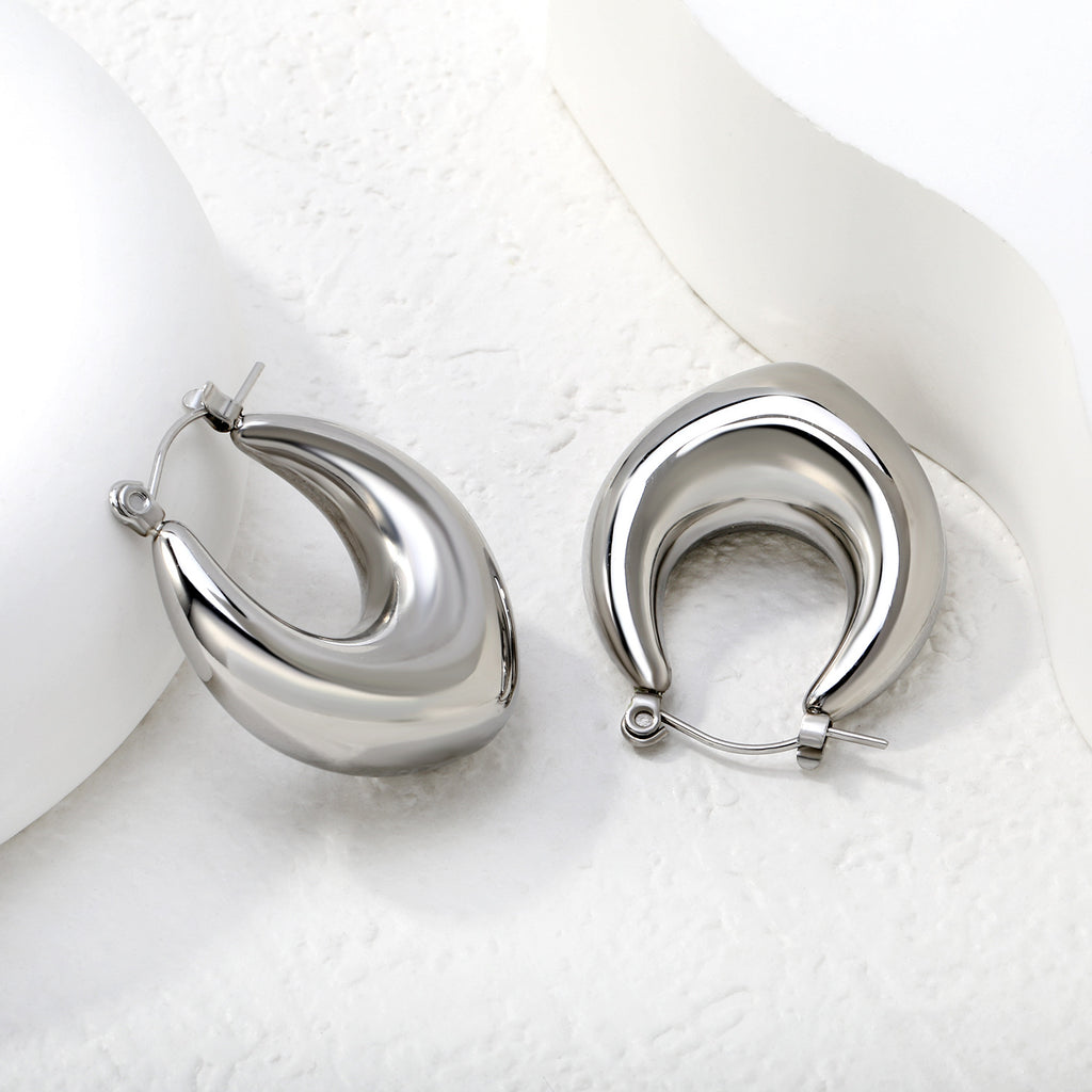 Damen Ohrringe mit modernem geschwungenem Design Shop Nory