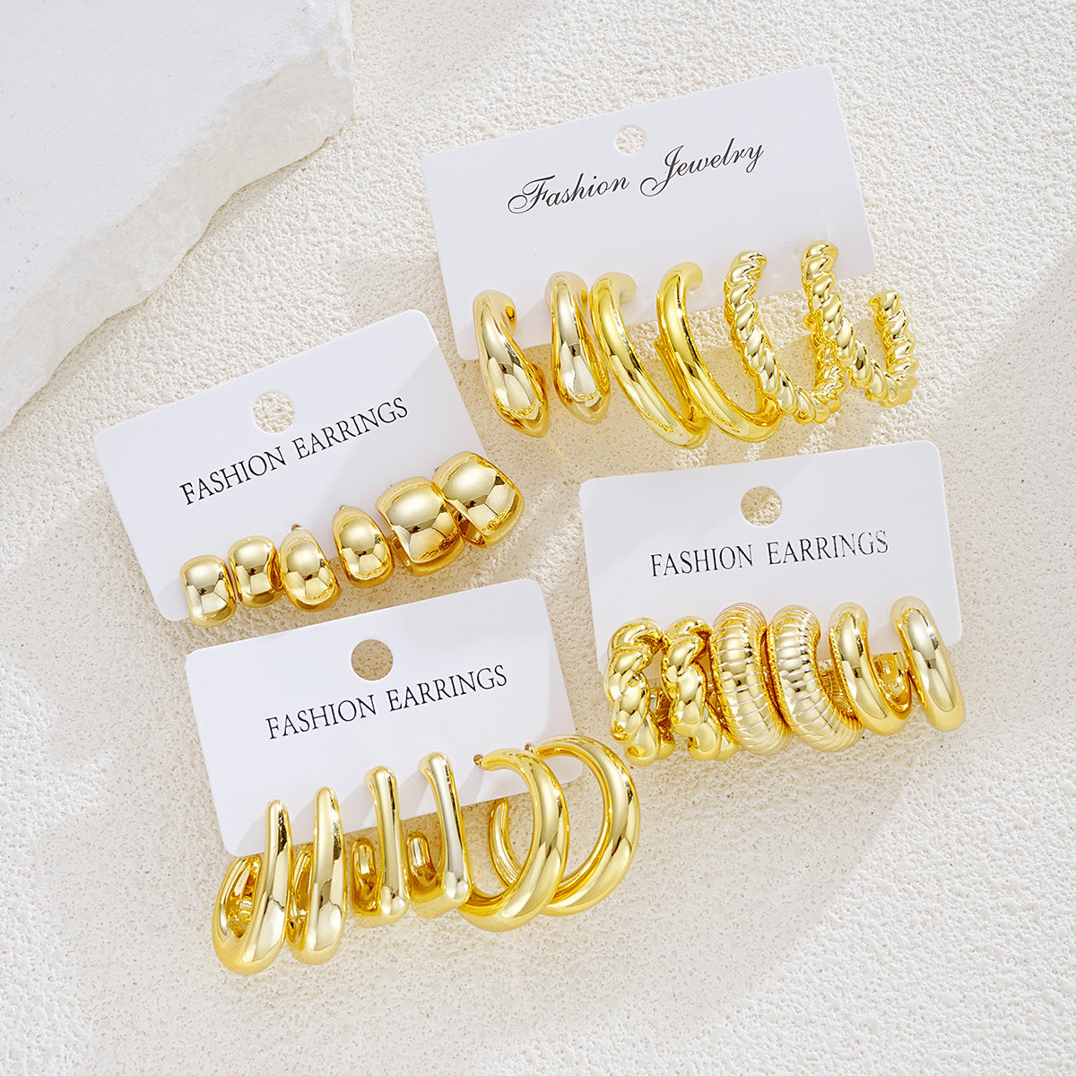 Damen Ohrstecker-Set mit modernen, geschwungenen und strukturierten Designs Shop Nory