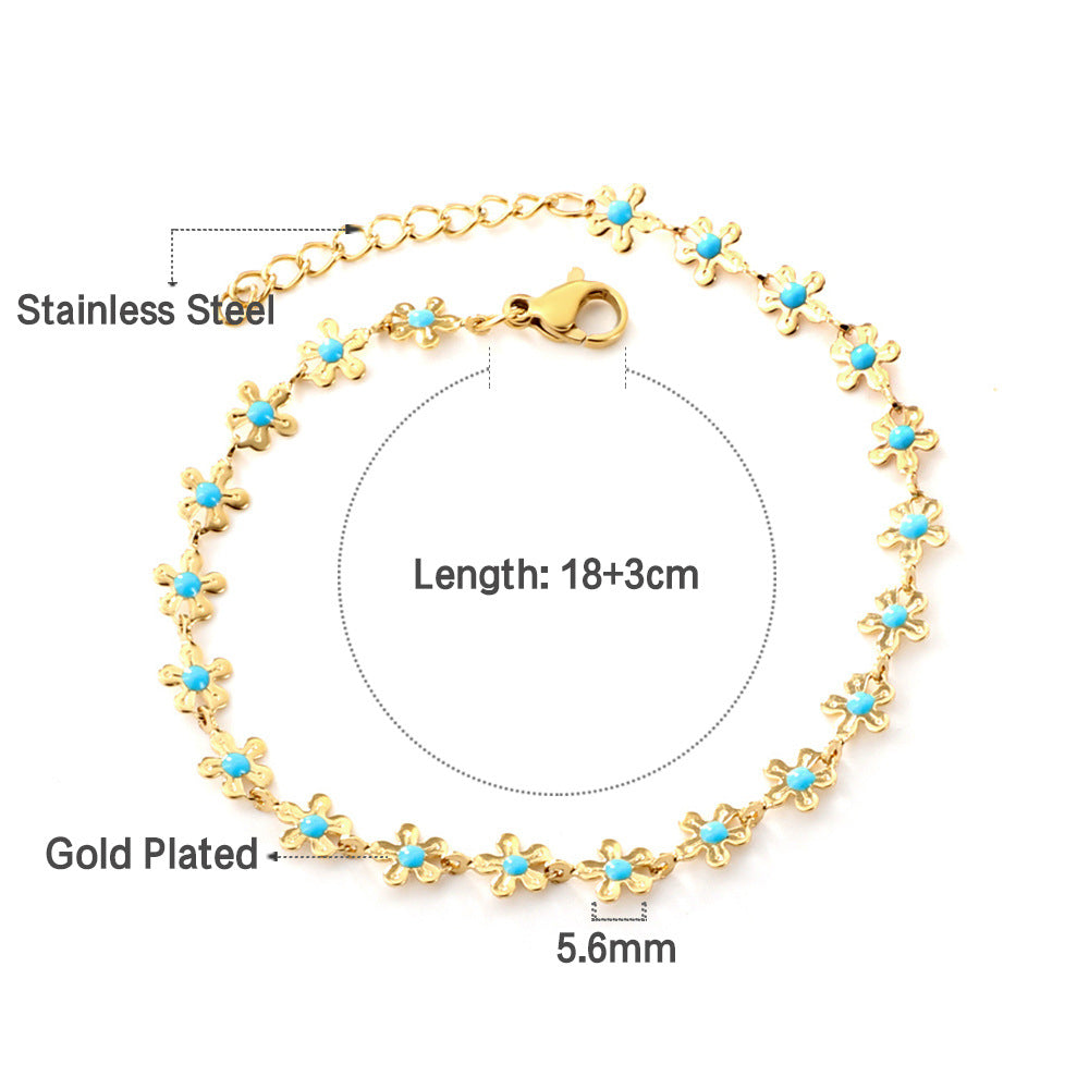 Damen Armband aus Edelstahl mit bunten Herz-Elementen und feiner Goldbeschichtung Shop Nory