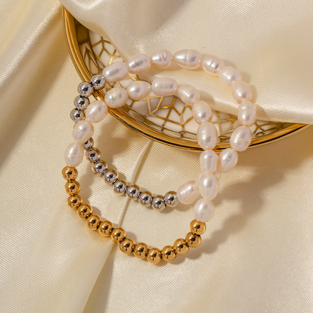 Damen elastisches Perlenarmband mit Edelstahl-Elementen Shop Nory