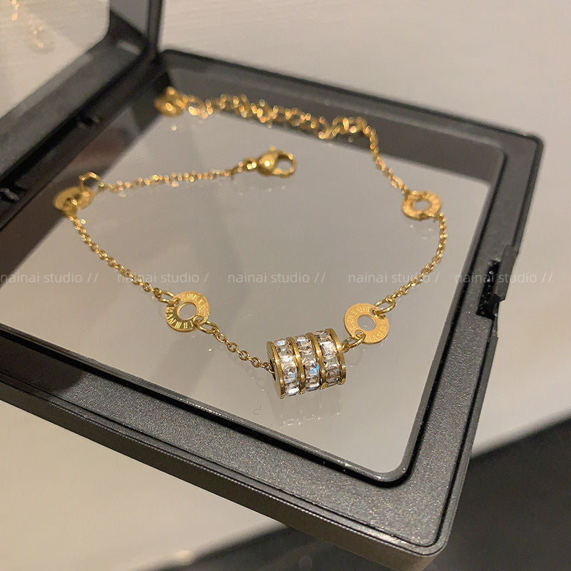 Damenarmband mit kunstvollen Blütenmotiven und hochwertiger Vergoldung Shop Nory
