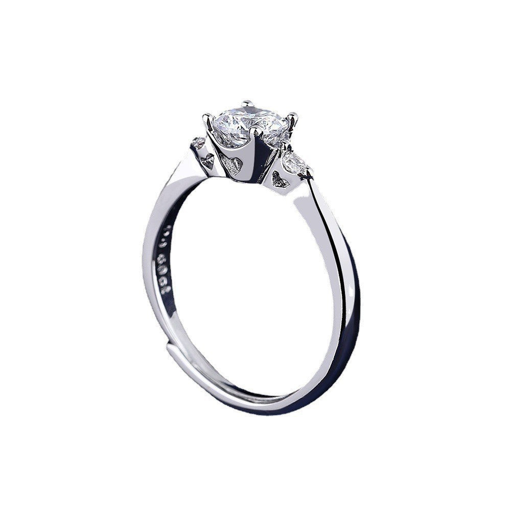 Damen eleganter Ring mit funkelndem Hauptstein und seitlichen Zirkonia Shop Nory