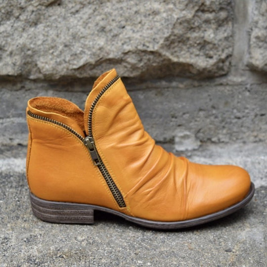 Damen Slouch‑AnklShop Noryoots aus Leder mit seitlichem Reißverschluss und niedrigem Blockabsatz Shop Nory