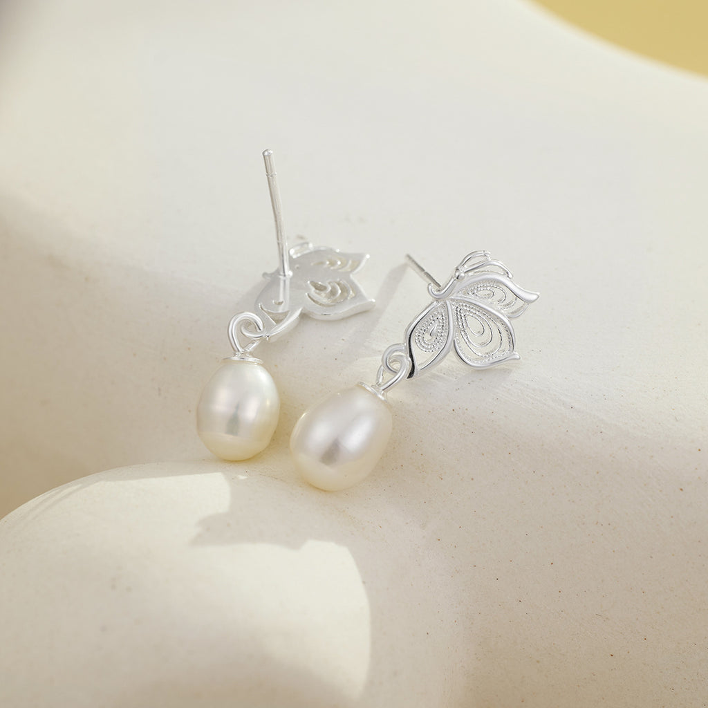 Damen elegante Ohrringe mit filigranem Schmetterlingsdesign und Perlenanhängern Shop Nory