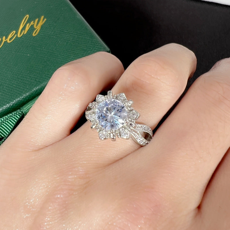 Damen Eleganter Blütenring mit funkelnden Zirkonia Shop Nory