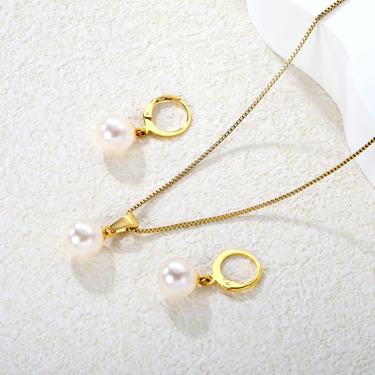 Damen Schmuckset aus hochwertigem Edelstahl mit eleganten Perlenanhängern Shop Nory