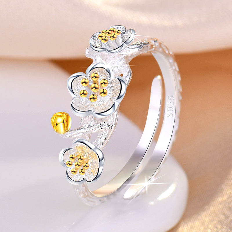 Damenring mit kunstvollem Blumenmuster und elegantem Zirkonia-Besatz Shop Nory