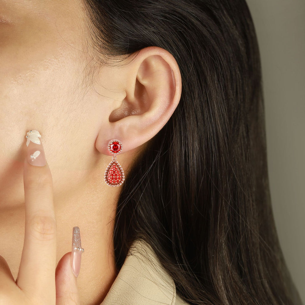 Damen Ohrringe mit funkelndem Kristallschmuck und tropfenförmigem Design Shop Nory
