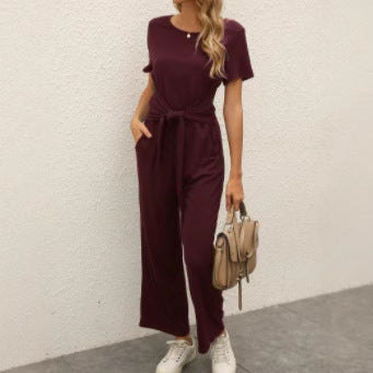 Damen Jumpsuit mit taillierbarem Bindegürtel und praktischen Taschen Shopnory