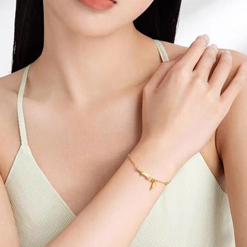 Damen filigranes Armband mit charmanten Anhängern Shop Nory