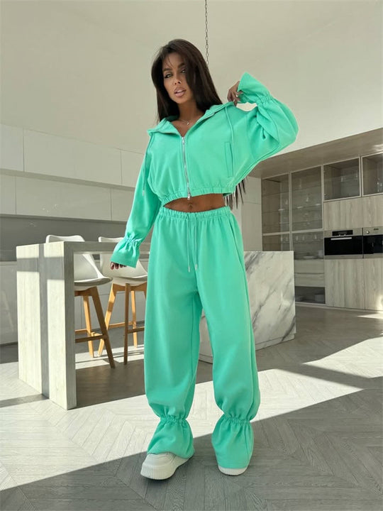 Damen Cropped-Kapuzenjacke mit Reißverschluss und taillierter Tunnelzug-Jogginghose Shop Nory