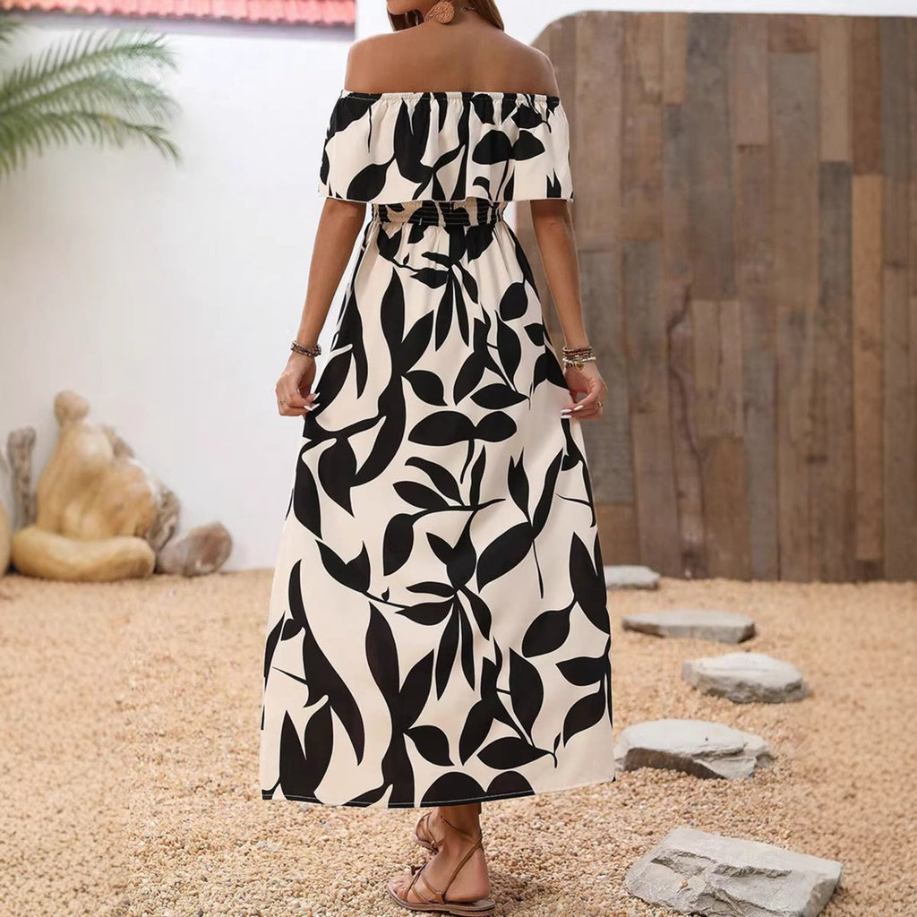 Damen Maxikleid mit schulterfreier Schnittführung und floralem Muster Shopnory