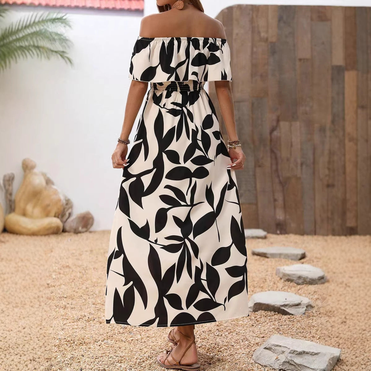 Damen Maxikleid mit schulterfreier Schnittführung und floralem Muster Shopnory