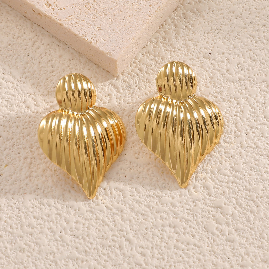 Damen Ohrclips im eleganten Wellenmuster Shop Nory