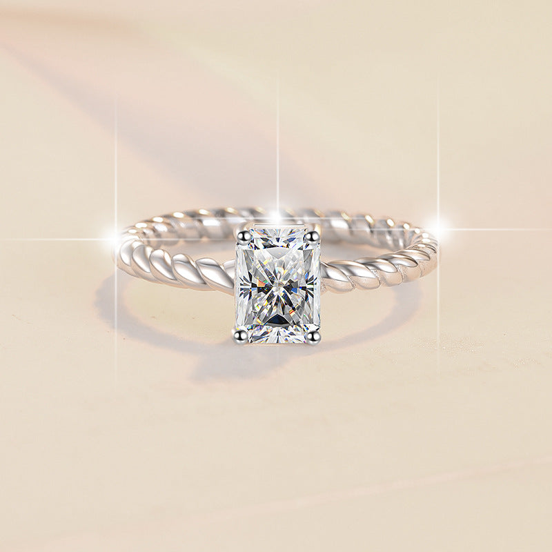 Damenring mit elegantem quadratischem Zirkonia und drehbarem Design Shop Nory