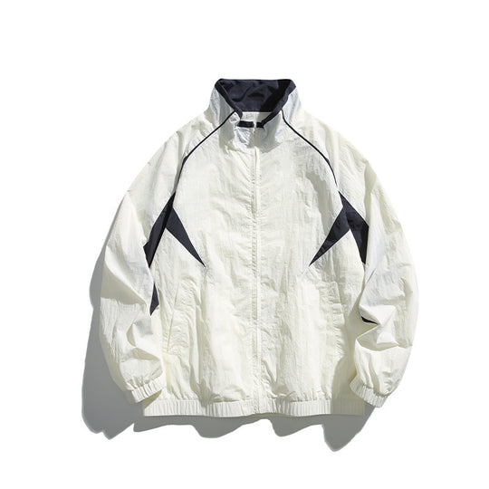 Unisex Leichte Boxy-Kapuzenjacke im Windbreaker-Stil mit Kontrastpaneelen und Raglanärmeln Shop Nory